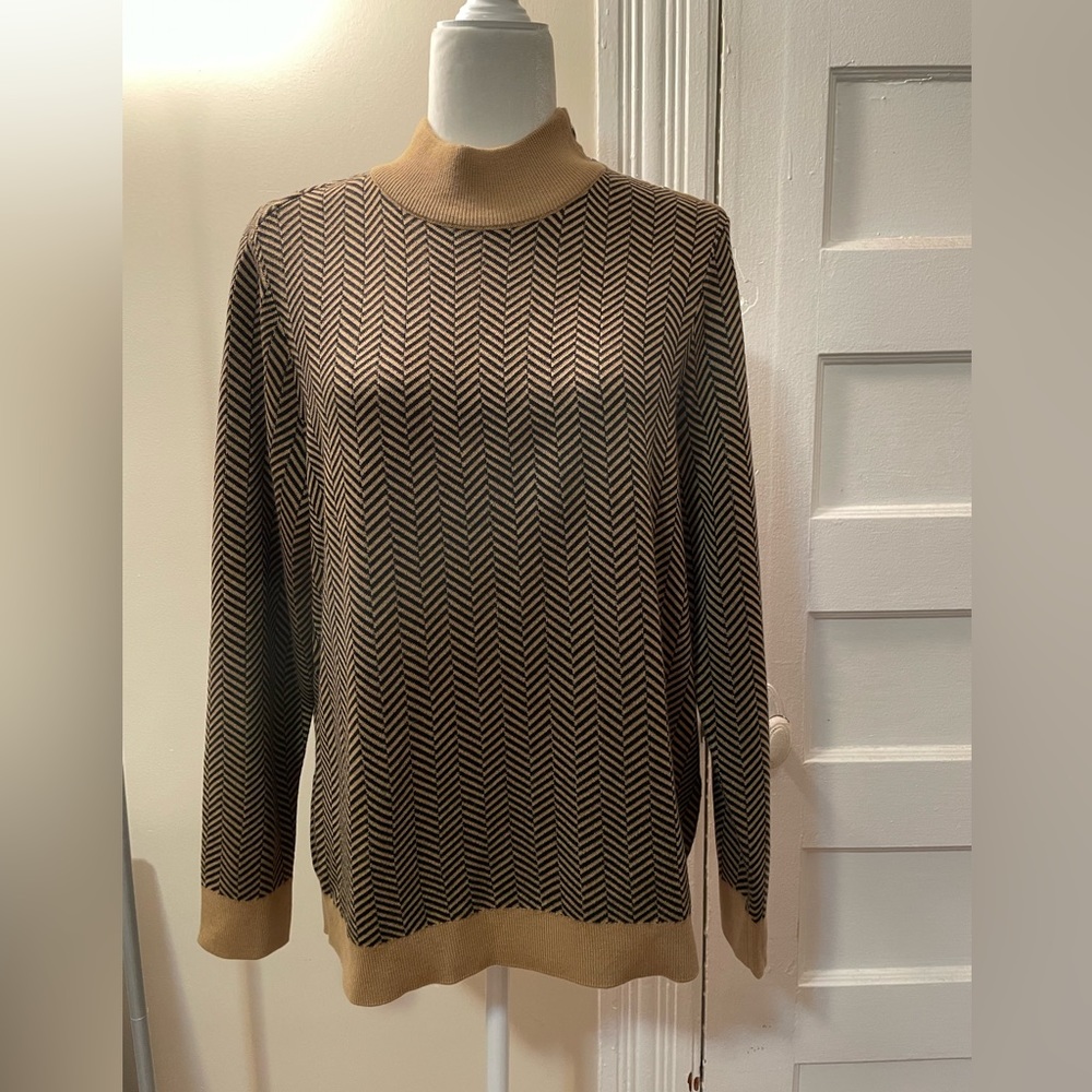 Calvin Klein woman’s sweater size large.
